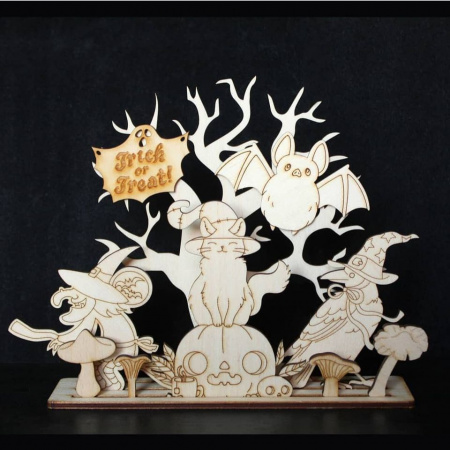 Котик у капелюсі відьми